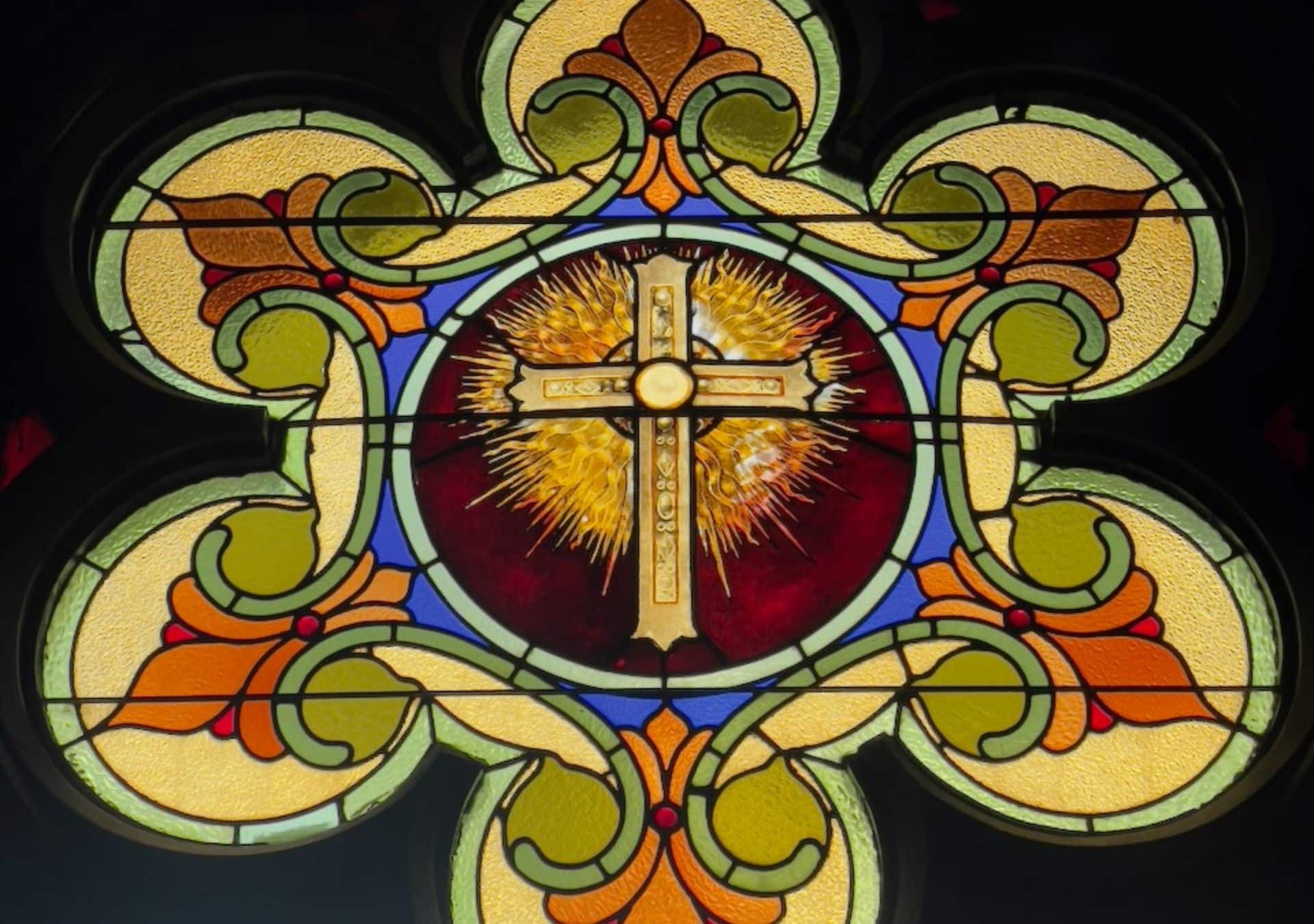 Colorful stained glass with cross
